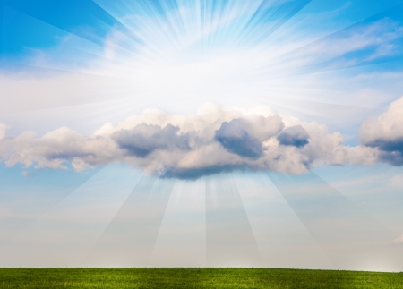 sun with clouds against the blue skyの写真素材