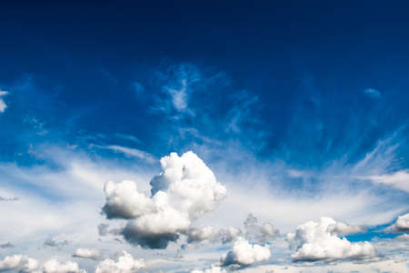 White clouds against the blue skyの写真素材