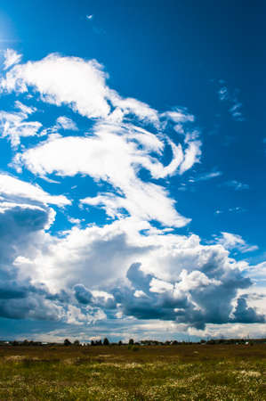 White clouds against the blue skyの写真素材
