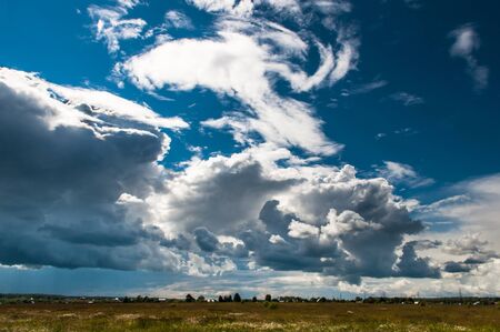 White clouds against the blue skyの写真素材