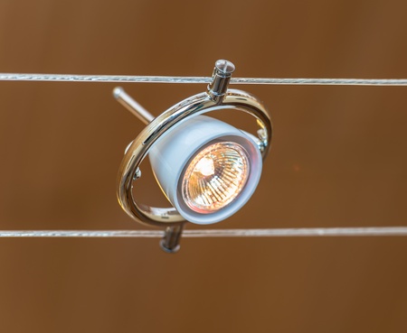 contemporary original lamp hanging on the ropes in the style of hi-techの写真素材