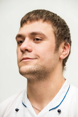 portrait of a young man in chefの写真素材
