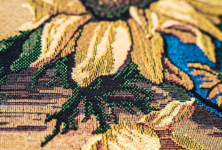 part of the abstract painting of flowers embroidered on the fabric tapestryの写真素材