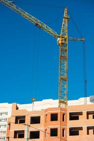 Building of the new high house by the craneのeditorial素材