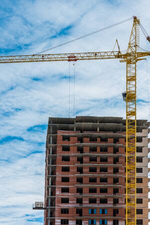 Building of the new high house by the craneのeditorial素材