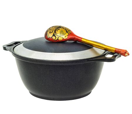 iron pan with a lid and spoonの写真素材