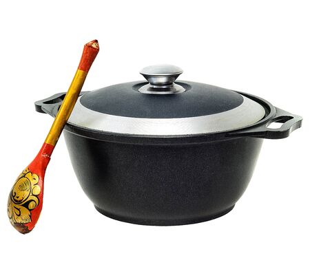 iron pan with a lid and spoonの写真素材