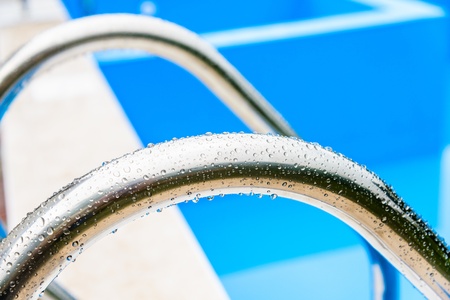 of the ladder, stainless steel basin with water dropsの写真素材