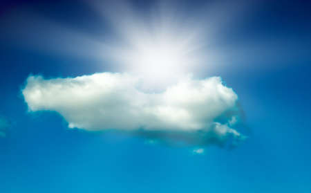 sun with clouds against the blue skyの写真素材