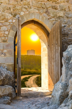 old wooden arch in the fortress with open doorsのeditorial素材