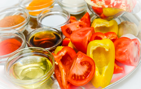 variety of spices and seasoning for cooking in glass cupsの写真素材