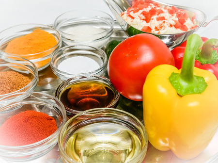 variety of spices and seasoning for cooking in glass cupsの写真素材