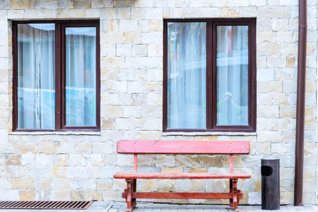 wooden bench on an iron frame with back seating