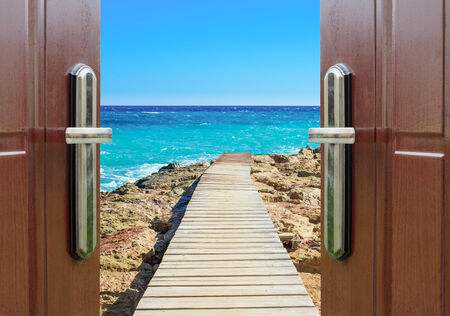 the view from the open window on the sea with a quayの写真素材