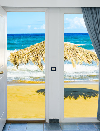 nature landscape with a view through a window with curtainsの写真素材