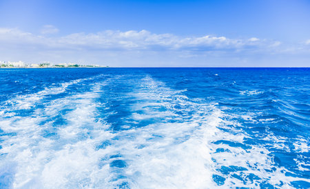 footprint on the sea water from the ship sailingの写真素材