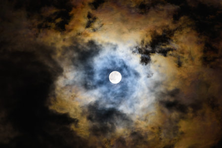 full moon night the moon is shining through the cloud