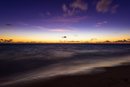 silhouette of palm beach at sunset the sunの写真素材