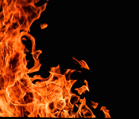 furious raging flames red fire black background