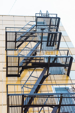 Side stairs outside the building structure for dangerous caseの写真素材