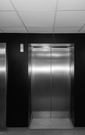 Elevator cabin stainless steel in a room on floor