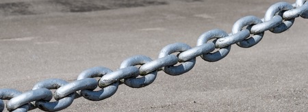 old painted powerful iron chain link fenceの写真素材