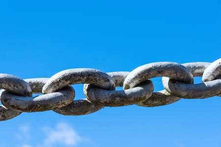 old painted powerful iron chain link fenceの写真素材