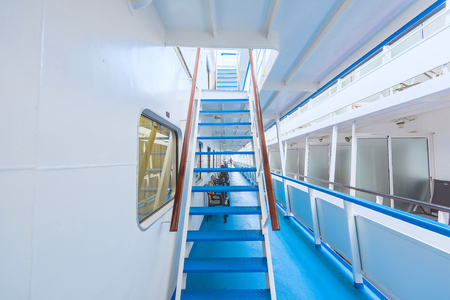 view of the side of a river cruise ship floats on the channelの写真素材