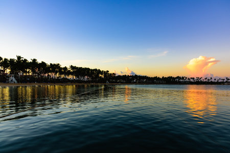 the calm sea in the sunset sky beautifully
