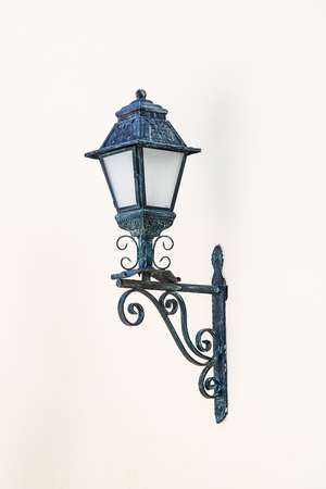 small lantern in a garden on the groundの写真素材