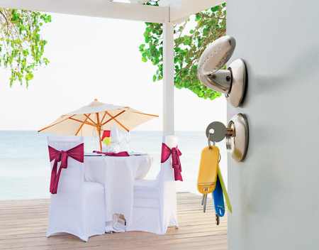 view from the hotel open door is covered with a festive romantic dinner table Caribbean Dominican Republicの写真素材