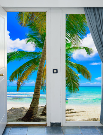 open door with access to the beach view of palms the Caribbean sea Dominican Republicの写真素材