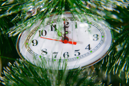 Christmas New Year clock shows the time five minutes before the holiday