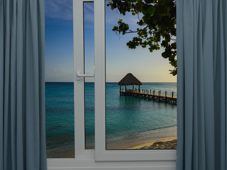 window open view of the gazebo in the seaの写真素材