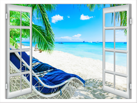 a large window with a curtain overlooking the beach palm treeの写真素材