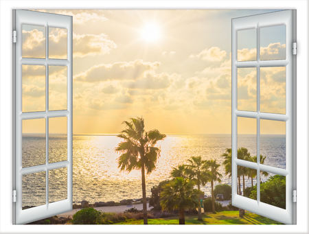 view from an open window with a curtain Caribbean sea Dominican Republic evening beautiful sunsetの写真素材
