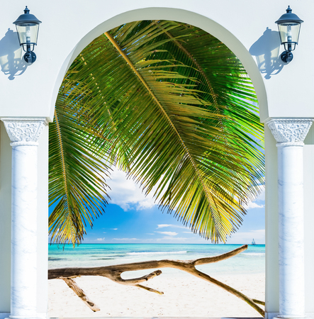 wooden open door arch view of the beach the Caribbean sea Dominican Republicの写真素材
