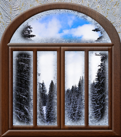 view through a frozen window on a rifle in winter nature landscapeの写真素材