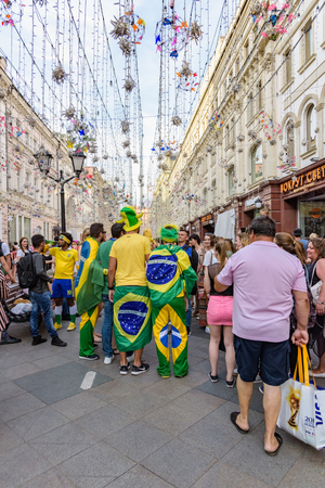 Russia, Moscow-June 2018. 2018 FIFA world Cup. On Nikolskaya street a group of football fans from different countries shouting and gesticulating is photographedのeditorial素材