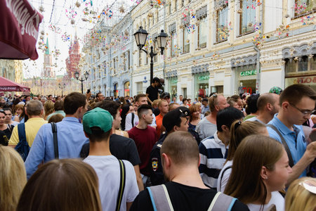Russia, Moscow-June 2018. 2018 FIFA world Cup. On Nikolskaya street a group of football fans from different countries shouting and gesticulating is photographedのeditorial素材