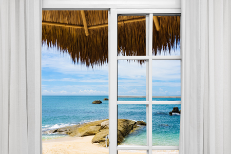 Ocean view from the window on the island of sunny summer dayの写真素材