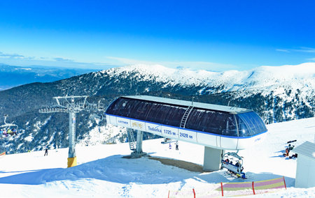 Bulgaria. Bansko. 12 February 2019.Ski resort in Bansko. Snowy ski slopes and  chair ski lifts...