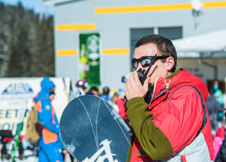 Bulgaria. Bansko. 12 February 2019.Bansko ski station, Kolarski ski lift at Banderishka polyana, skiers on ski slopes, mountain. With pine trees, people. Snowのeditorial素材