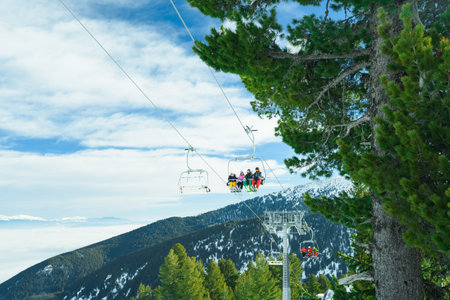 Bulgaria. Bansko. 11 February 2019. Chair ski lift. Elevator lifting people on the mountain ski...