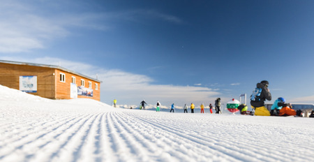 Bulgaria. Bansko. 12 February 2019.Ski resort in Bansko. Snowy ski slopes and  chair ski lifts station in  winter mountain ski resort. Under blue sky on sunny dayのeditorial素材