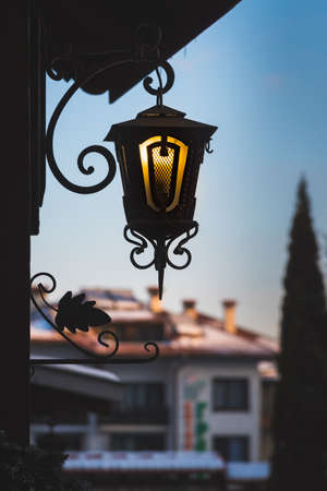 Old lantern hanging on the wallの写真素材