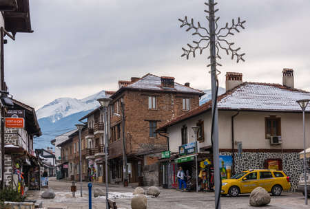Bansko, Bulgaria-February 11 .2020. Old streets of Bansko in Bulgaria.Nice Sunny weather. Holidays people relax in the ski resort in the winterのeditorial素材