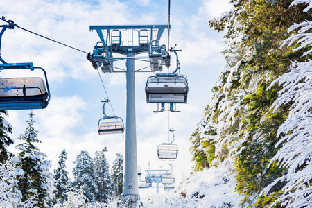 Bulgaria. Bansko. 10 February 2020.Ski resort in Bansko. Snowy ski slopes and  chair ski lifts...