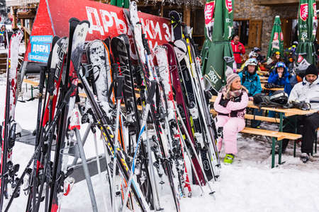 Bulgaria. Bansko. 12 February 2020.Bansko ski station, Kolarski ski lift at Banderishka polyana, skiers on ski slopes, mountain. With pine trees, people. Snowのeditorial素材