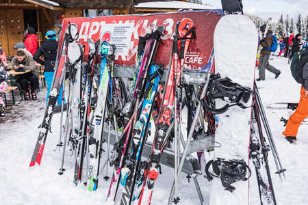 Bulgaria. Bansko. 12 February 2020.Bansko ski station, Kolarski ski lift at Banderishka polyana, skiers on ski slopes, mountain. With pine trees, people. Snowのeditorial素材